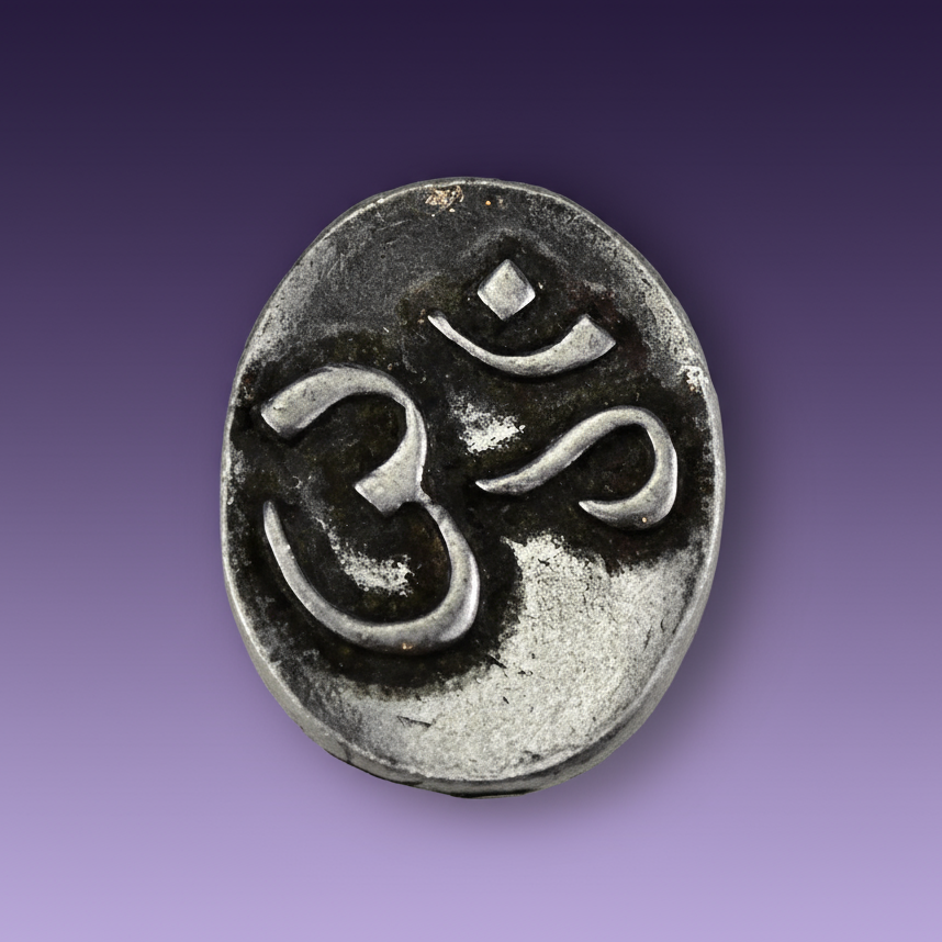 Exact Om/Aum pocket stone with clean professional styling and Witchy Like watermark
